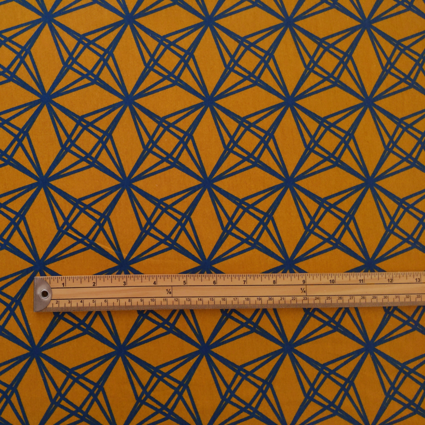 Cotton Jersey in Mustard with Abstract Motif