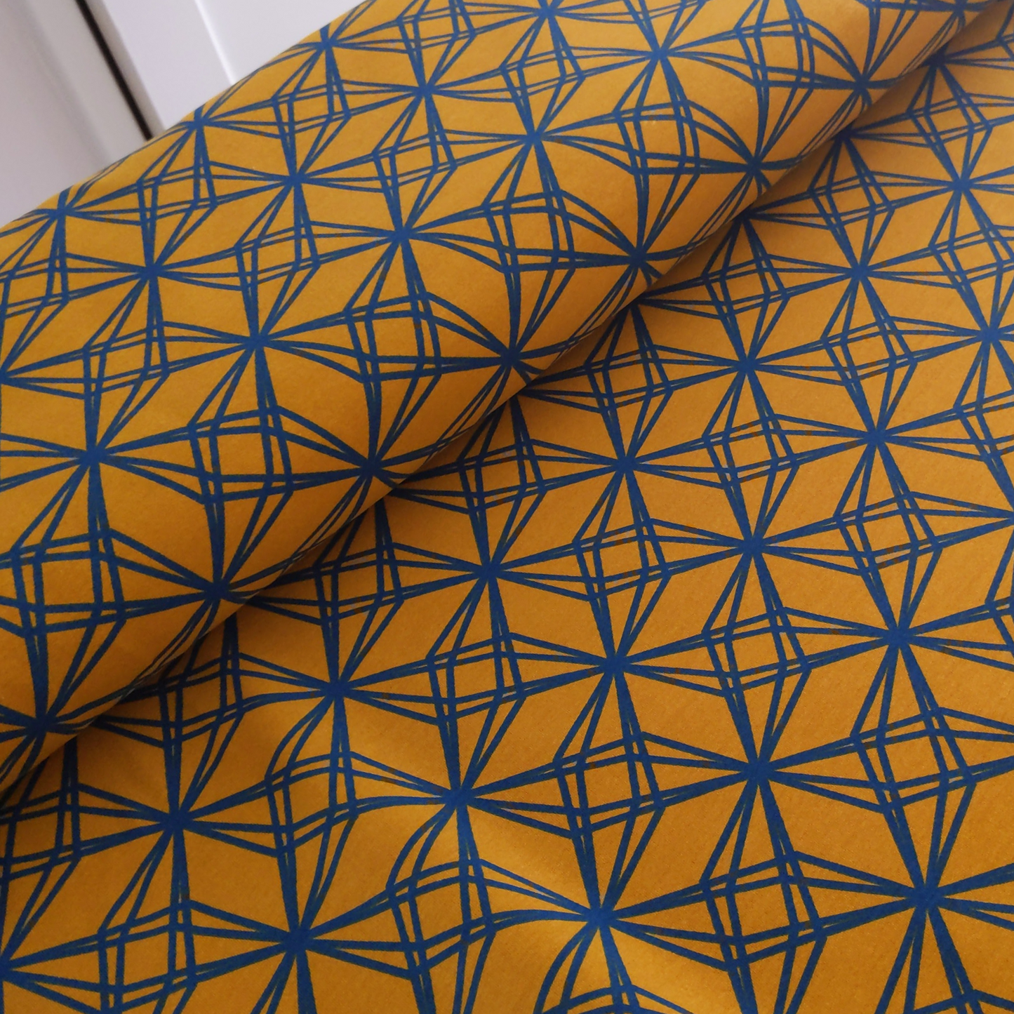 Cotton Jersey in Mustard with Abstract Motif