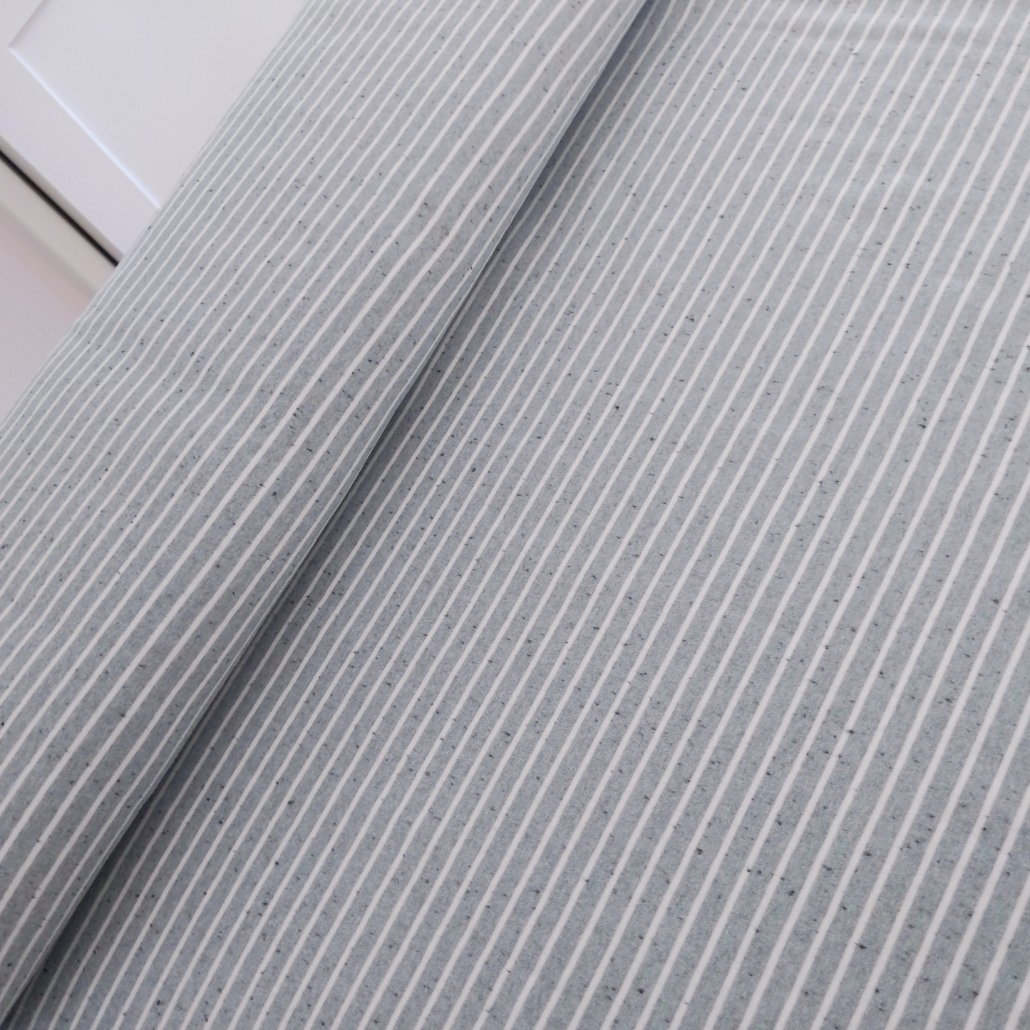 Cotton Jersey Melange in Old Green with Black Stripes